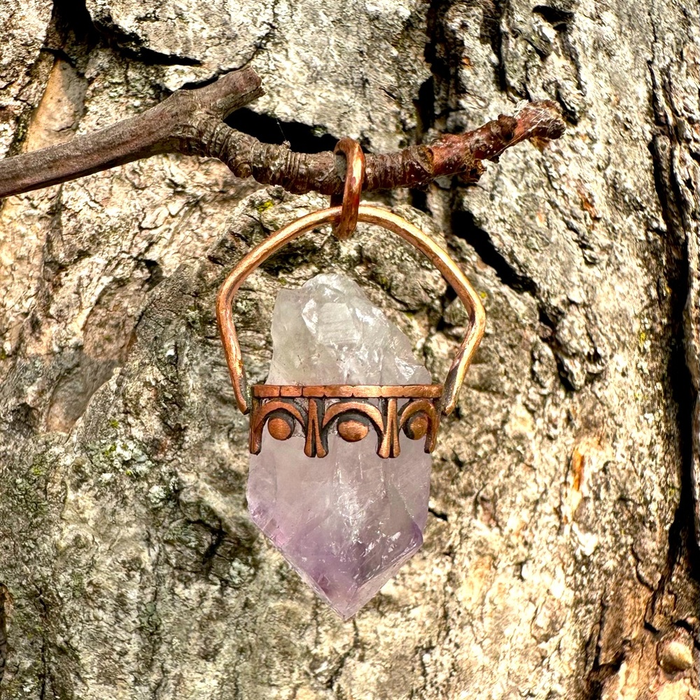 Raw amethyst pendant in pure copper.